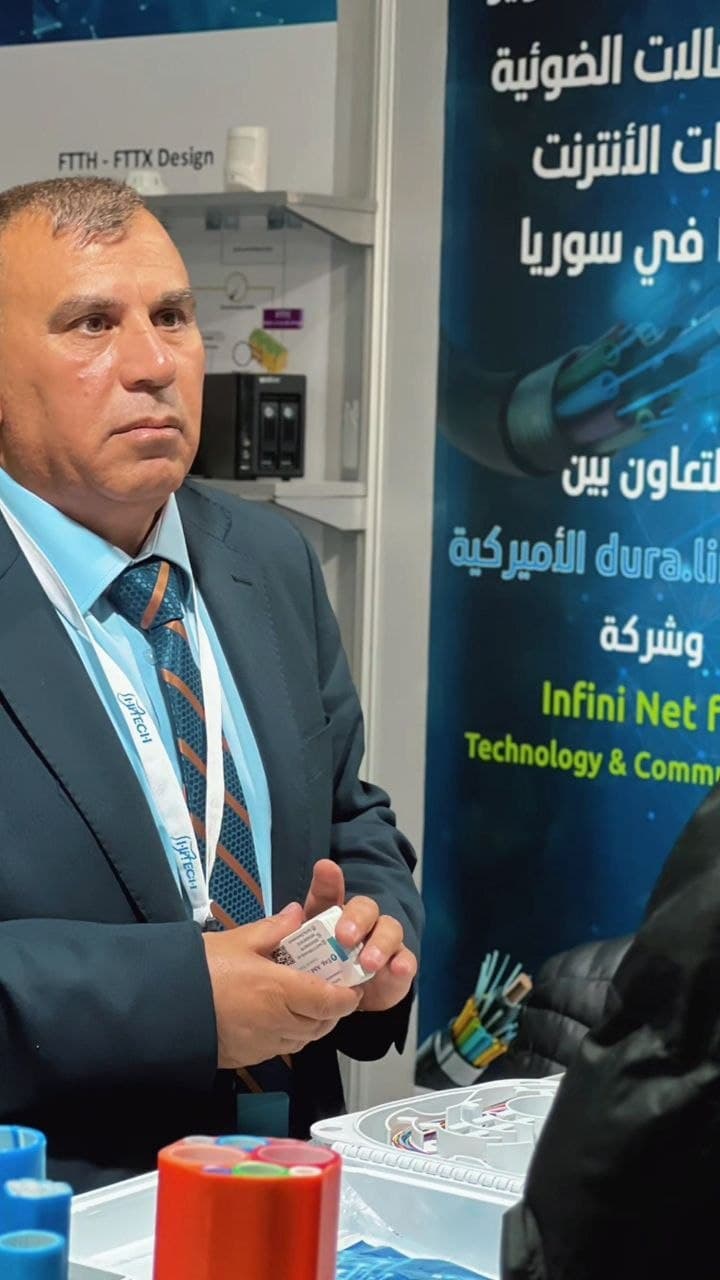 An Infini Net representative at the company's fibre-optic exhibition stand