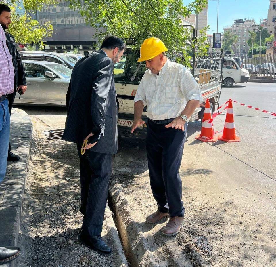Inspecting a fibre cable trench on a city street